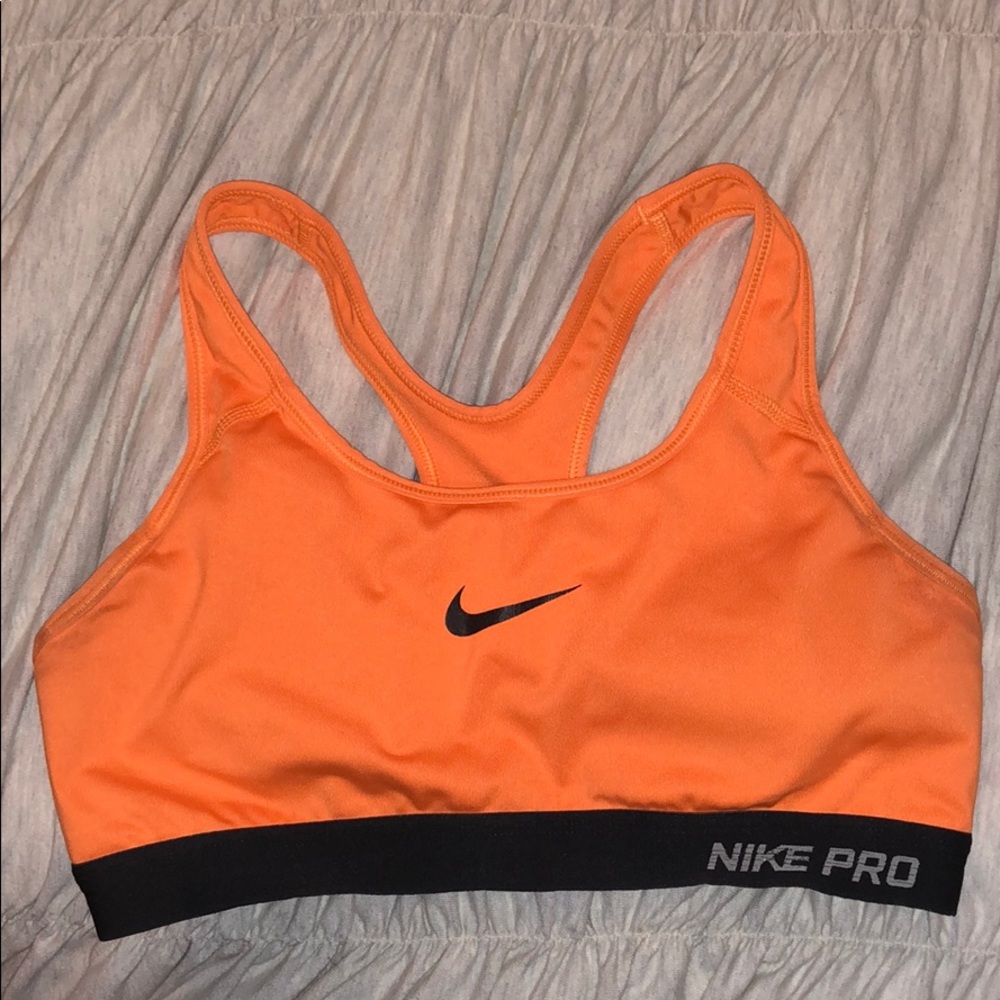 Orange Nike sports bra with padding